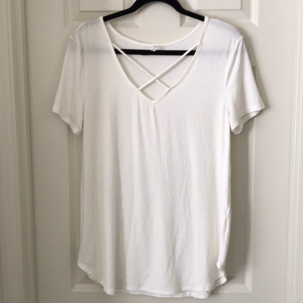 White jersey top with criss cross neckline